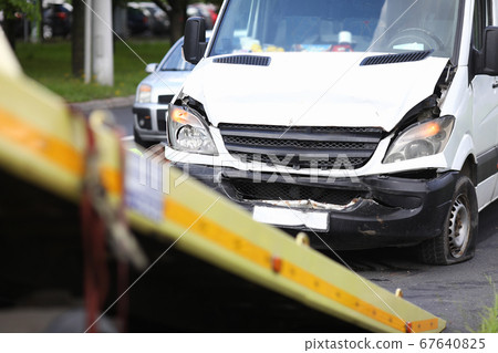 Car after an accident calls in on tow truck Car after an accident calls in on tow truck 67640825