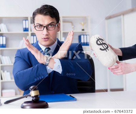 Judge in bribe concept with money Judge in bribe concept with money 67643372