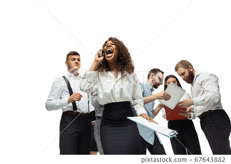 Nervous tensioned investors analyzing crisis stock market with charts on screen of their gadgets Nervous tensioned investors analyzing crisis stock market with charts on screen of their gadgets 67643882