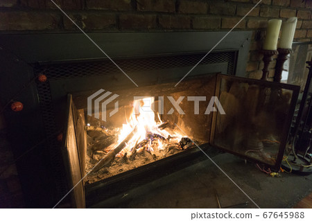 Western fireplace where firewood burns Western fireplace where firewood burns 67645988