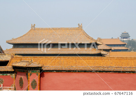 Forbidden City, Beijing, China. Red walls and yellow roofs of the Forbidden City. The Forbidden City has traditional Chinese architecture. The Forbidden City is also the Palace Museum, Beijing, China. 67647116