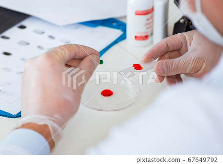 Drug synthesis lab experimentnig with pills 67649792