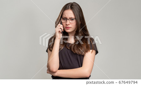 disturbing call distant conflict troubled woman 67649794