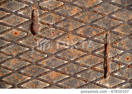 rusty metal sheet with a grid as the background rusty metal sheet with a grid as the background 67650107