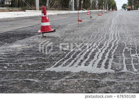 road construction or repair - laying a new layer 67650180