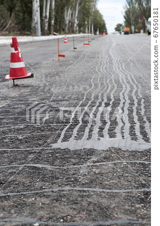 road construction or repair - laying a new layer 67650181