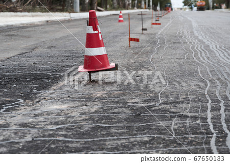 road construction or repair - laying a new layer road construction or repair - laying a new layer 67650183
