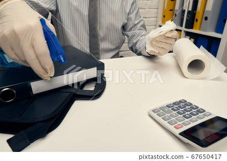 concept of cleaning or disinfecting the office 67650417