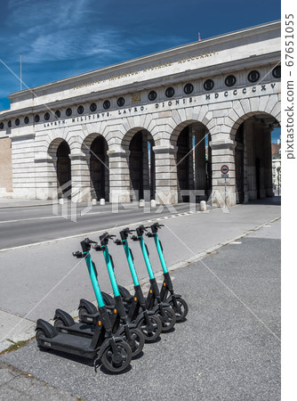 Rental Electric Scooters, e-scooter, Parked In Group In Front Of Historic Building In Vienna Austria Rental Electric Scooters, e-scooter, Parked In Group In Front Of Historic Building In Vienna Austria 67651055