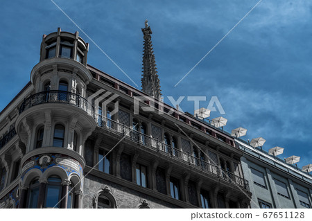 Tower Of Stephansdom Cathedral Behind Historic Building With Sun Parasols In The Inner City Of Vienna In Austria 67651128