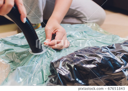 Space saver saving seal bag sucking air out , vacuum clothing storage compressed package. 67651843