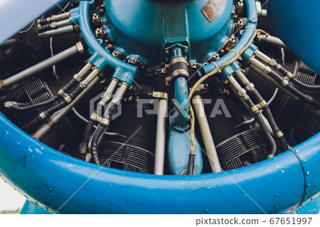 Close up view of a vintage propeller passenger and cargo airplane. 67651997