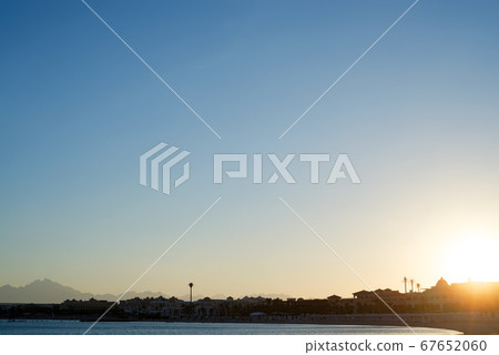 Beautiful sunset or sunrise on a seacoast. Beautiful sunset or sunrise on a seacoast. 67652060