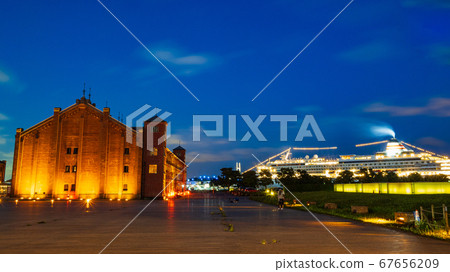 Yokohama red brick warehouse and cruise liner night view 67656209