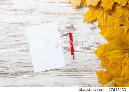 White paper sheet and pencil lies on desk White paper sheet and pencil lies on desk 67659483