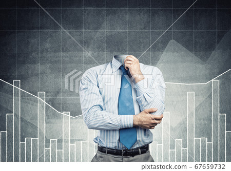 Headless pensive businessman Headless pensive businessman 67659732