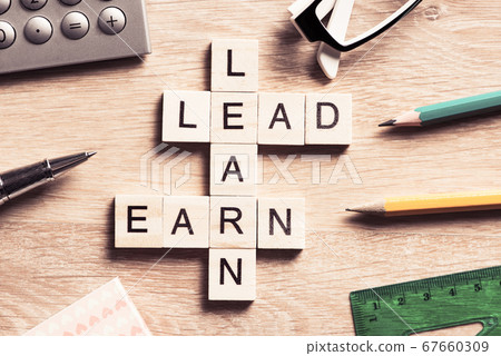 Conceptual business keywords on table with elements of game maki 67660309