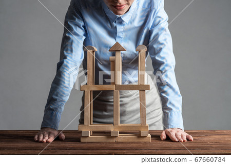Business woman building construction on table 67660784