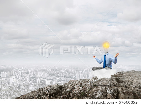 Businessman relaxing and waiting for inspiration Businessman relaxing and waiting for inspiration 67660852