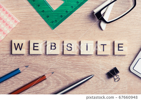 Computer and internet conceptual words spelled with game wooden Computer and internet conceptual words spelled with game wooden 67660948