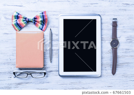 Gentleman kit of tablet watch glasses bow tie and notebook on wo Gentleman kit of tablet watch glasses bow tie and notebook on wo 67661503