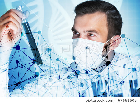 Portrait of concentrated male scientist working with reagents in laboratory Portrait of concentrated male scientist working with reagents in laboratory 67661603