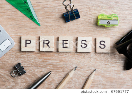 Mass media conceptual words spelled with wooden cubes on desk Mass media conceptual words spelled with wooden cubes on desk 67661777