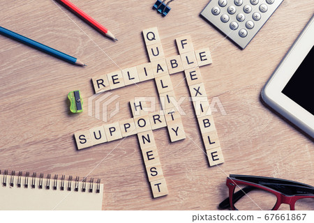 Conceptual business keywords on table with elements of game making crossword Conceptual business keywords on table with elements of game making crossword 67661867