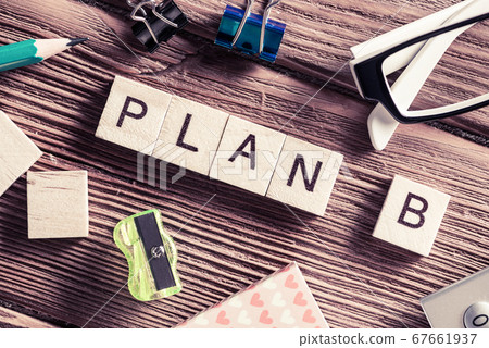 Conceptual business keywords on table with elements of game making crossword Conceptual business keywords on table with elements of game making crossword 67661937