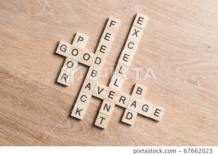 Conceptual business keywords on table with elements of game making crossword Conceptual business keywords on table with elements of game making crossword 67662023