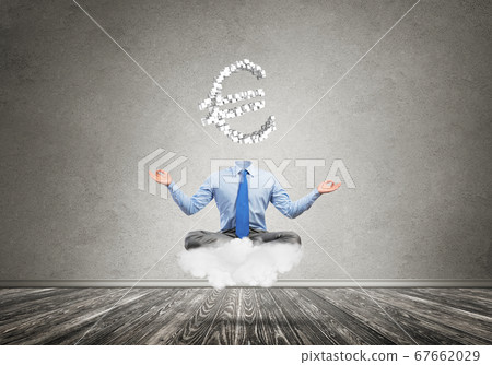 Headless meditating businessman 67662029