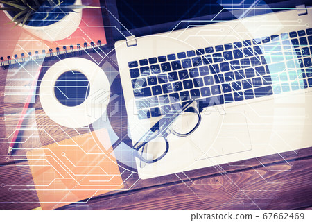 Business workplace with laptop coffee cup and security concept o Business workplace with laptop coffee cup and security concept o 67662469