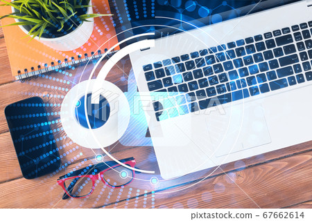 Business workplace with laptop coffee cup and security concept on screen Business workplace with laptop coffee cup and security concept on screen 67662614