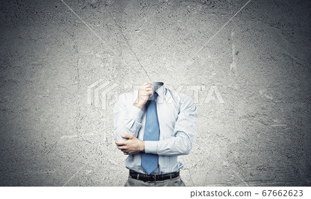 Headless pensive businessman Headless pensive businessman 67662623