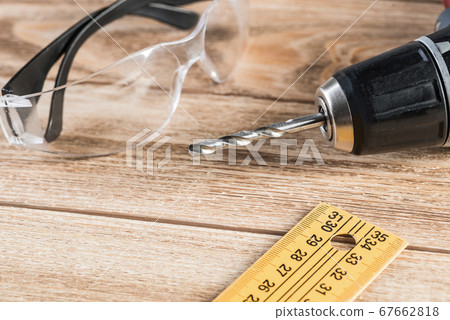 Carpentry tools on wooden surface Carpentry tools on wooden surface 67662818