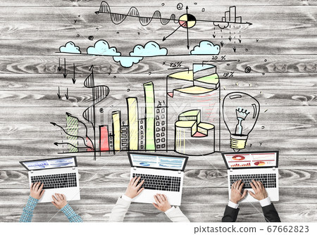Top view of businesspeople sitting at table and using gadgets Top view of businesspeople sitting at table and using gadgets 67662823