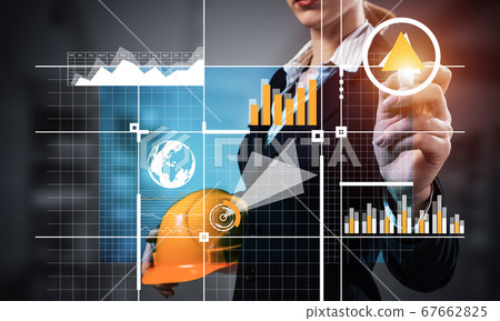 Businesswoman pointing on 3d financial chart Businesswoman pointing on 3d financial chart 67662825