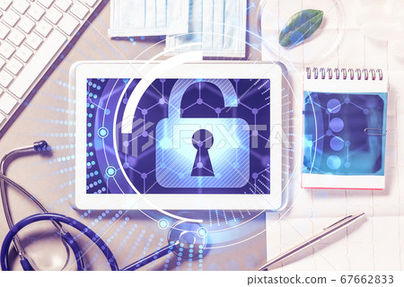 Top view of doctor workplace with tablet pc and medicine tools o Top view of doctor workplace with tablet pc and medicine tools o 67662833