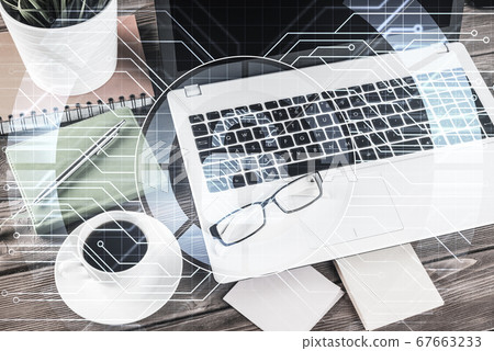 Business workplace with laptop coffee cup and security concept o Business workplace with laptop coffee cup and security concept o 67663233