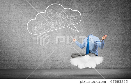 Headless businessman meditating Headless businessman meditating 67663235