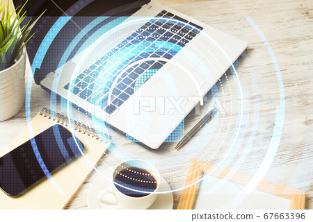 Business workplace with laptop coffee cup and security concept o Business workplace with laptop coffee cup and security concept o 67663396