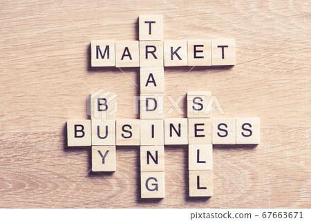 Conceptual business keywords on table with elements of game making crossword Conceptual business keywords on table with elements of game making crossword 67663671