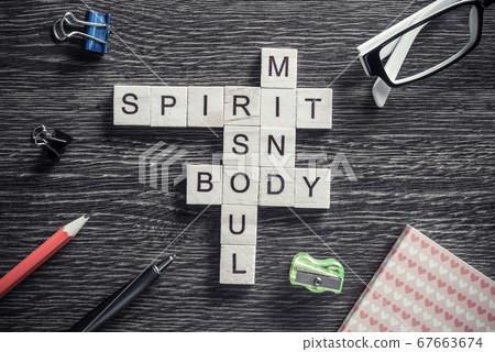 Conceptual business keywords on table with elements of game making crossword Conceptual business keywords on table with elements of game making crossword 67663674