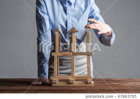 Business woman building construction on table 67663785