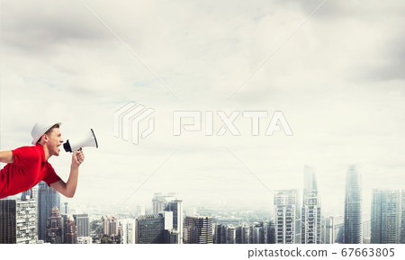 Guy screaming in loudspeaker 67663805