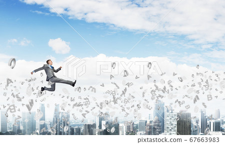 Businessman jumping high Businessman jumping high 67663983
