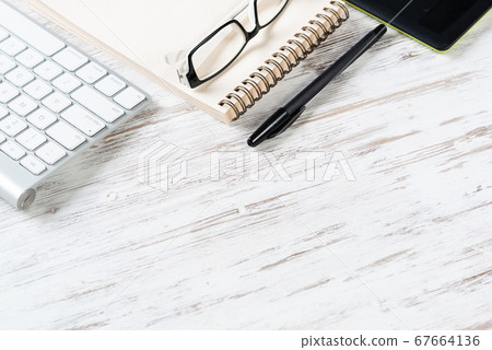 Still life of office workspace with supplies 67664136