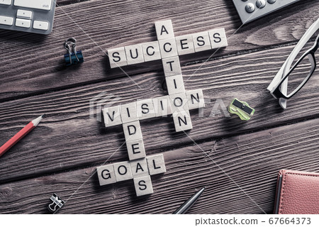 Conceptual business keywords on table with elements of game maki 67664373