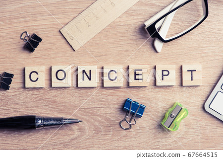 Elements of game with letters spelling business keywords on workplace Elements of game with letters spelling business keywords on workplace 67664515