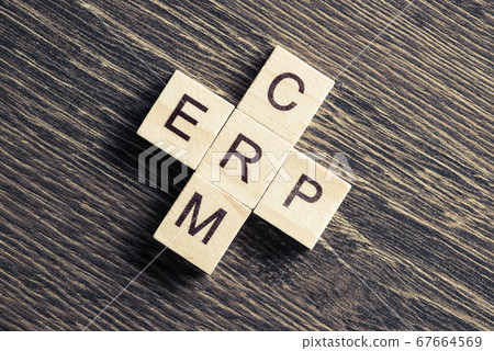 Conceptual business keywords on table with elements of game making crossword 67664569